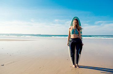 Image showing Surfer girl