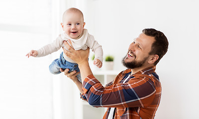 Image showing happy father with little baby boy at home