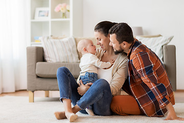 Image showing happy family with baby having fun at home