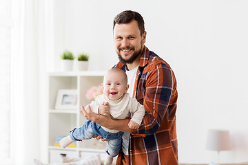 Image showing happy father with little baby boy at home