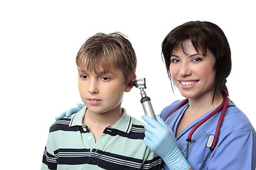 Image showing Doctor checking childs ears