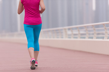 Image showing woman running on the promenade