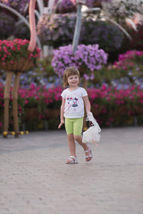 Image showing little girl with a doll