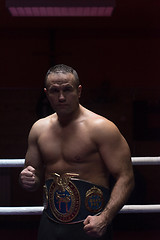 Image showing kick boxer with his championship belt