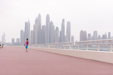 Image showing woman stretching and warming up