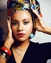 Image showing beauty bright african woman with creative make up, shawl on head like cubian