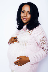 Image showing young pretty african american woman pregnant happy smiling, posing on white background isolated , lifestyle people concept