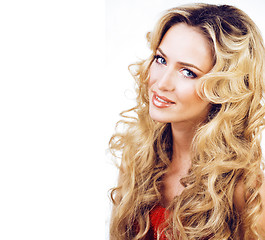 Image showing beauty blond woman with long curly hair close up isolated, hairstyle waves