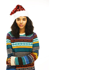 Image showing cute young girl in santas red hat isolated