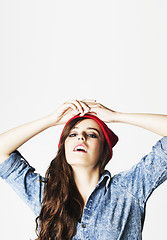 Image showing young cheerful brunette teenage girl on white background