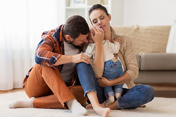 Image showing happy family with baby at home