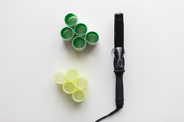 Image showing curling iron or hot styler and hair curlers