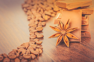 Image showing Coffee beans close up and chocolate