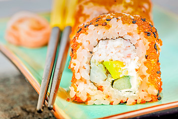 Image showing California maki sushi with masago and ginger