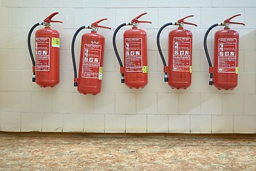 Image showing Fire extinguishers on the wall