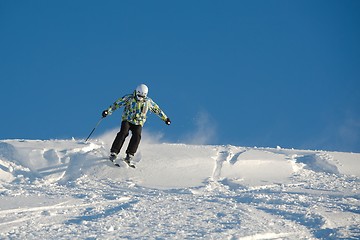 Image showing Skiing in fresh powder snow