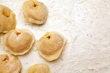 Image showing dumplings in flour 