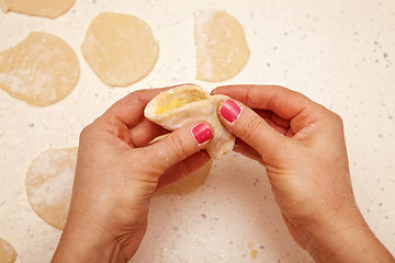 Image showing chef prepares dumplings with curd