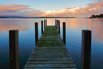 Image showing Mossy jetty at sunset