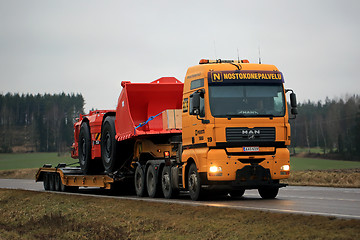 Image showing Yellow MAN Semi Trailer Hauls Underground Loader