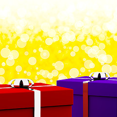 Image showing Red And Blue Gift Boxes With Yellow Bokeh Background As Presents