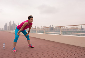 Image showing woman stretching and warming up