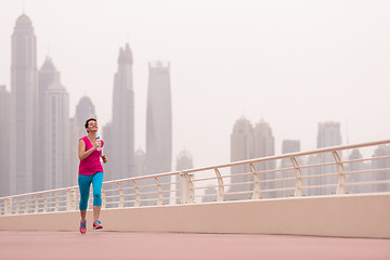 Image showing woman running on the promenade