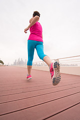 Image showing woman running on the promenade