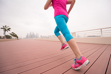 Image showing woman running on the promenade