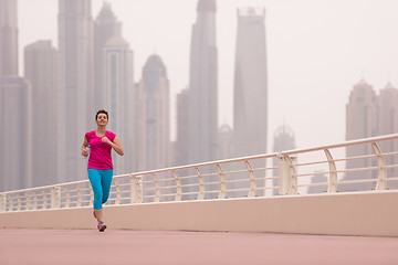 Image showing woman running on the promenade