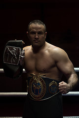 Image showing kick boxer with his championship belt