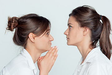 Image showing Studio portrait of female twins