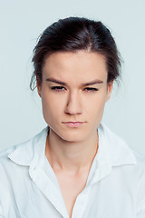 Image showing The young woman\'s portrait with thoughtful emotions