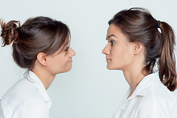 Image showing Studio portrait of female twins