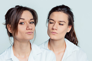 Image showing Studio portrait of female twins