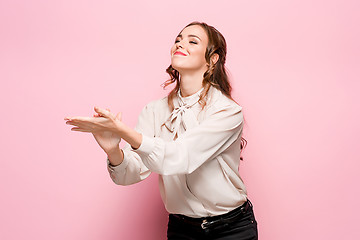 Image showing The young woman\'s portrait with happy emotions