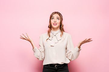 Image showing Portrait of young woman with shocked facial expression