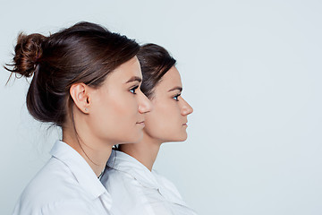 Image showing Studio portrait of female twins