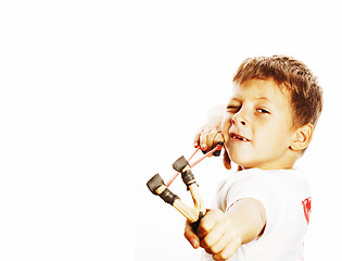Image showing little cute angry real boy with slingshot isolated