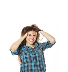 Image showing young pretty woman posing on white background isolated emotional