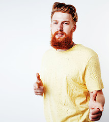 Image showing young handsome hipster ginger bearded guy looking brutal isolate