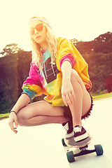 Image showing Girl Riding Skateboard