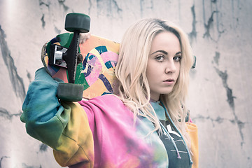 Image showing Girl Holding Skateboard