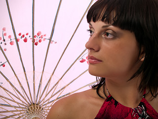 Image showing Lady with asian umbrella