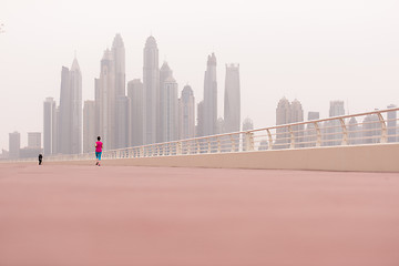 Image showing woman running on the promenade