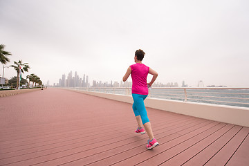 Image showing woman running on the promenade