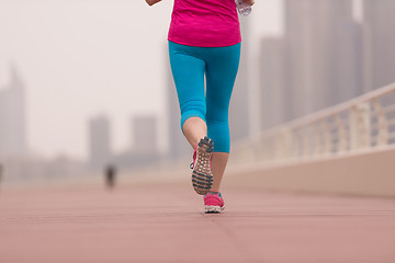 Image showing woman running on the promenade