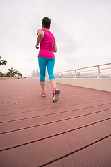 Image showing woman running on the promenade