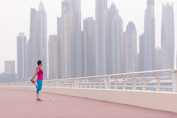 Image showing woman stretching and warming up