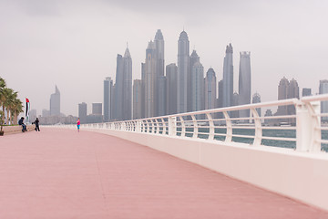 Image showing woman running on the promenade